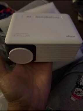 Compact White Mini Projector with Lens Cap